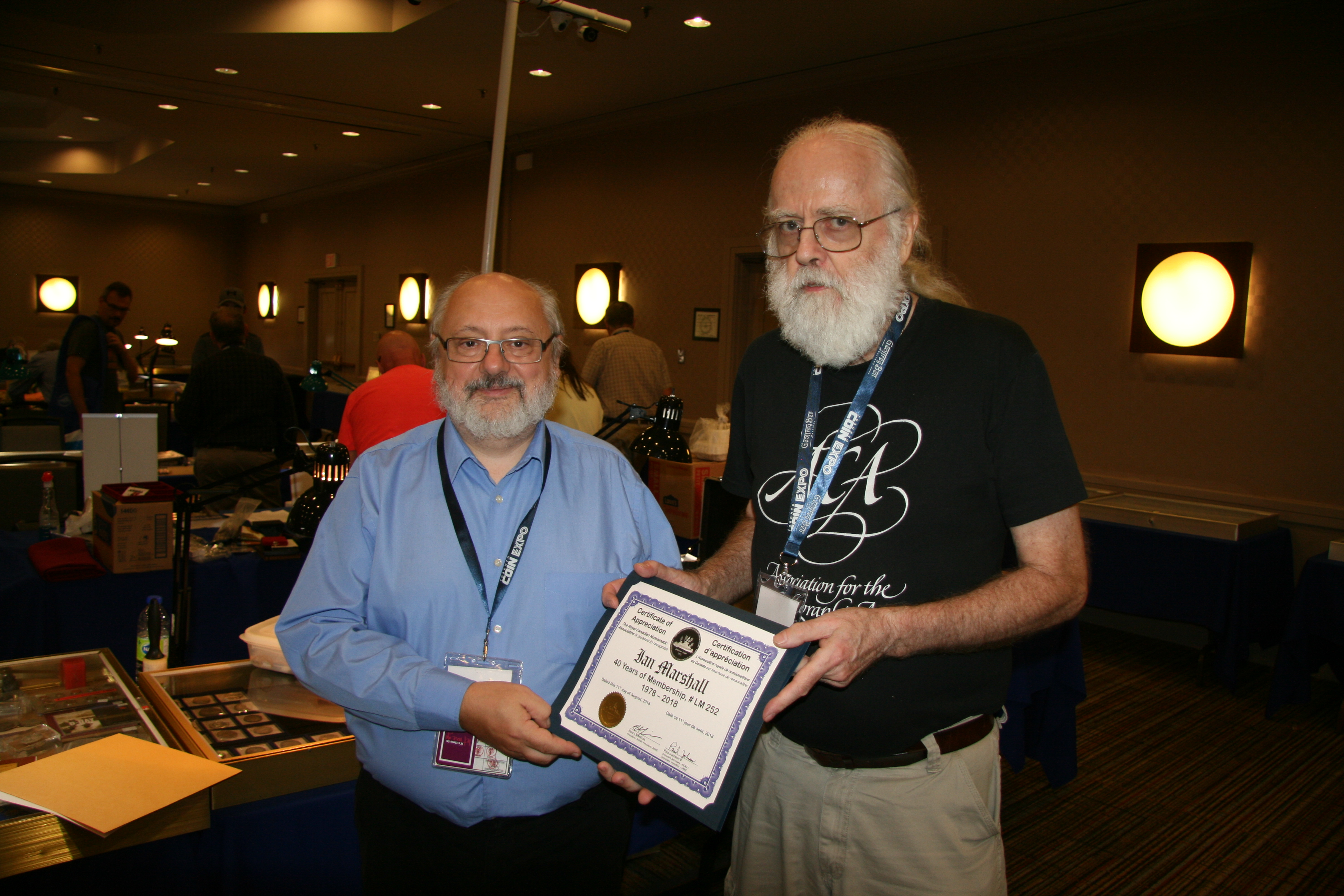 <p><strong>Ian Marshall</strong> (right) receiving his 40 years of membership recognition award from <strong>Henry Nienhuis</strong> (left).<br> <small>Dan Gosling photo</small></p>